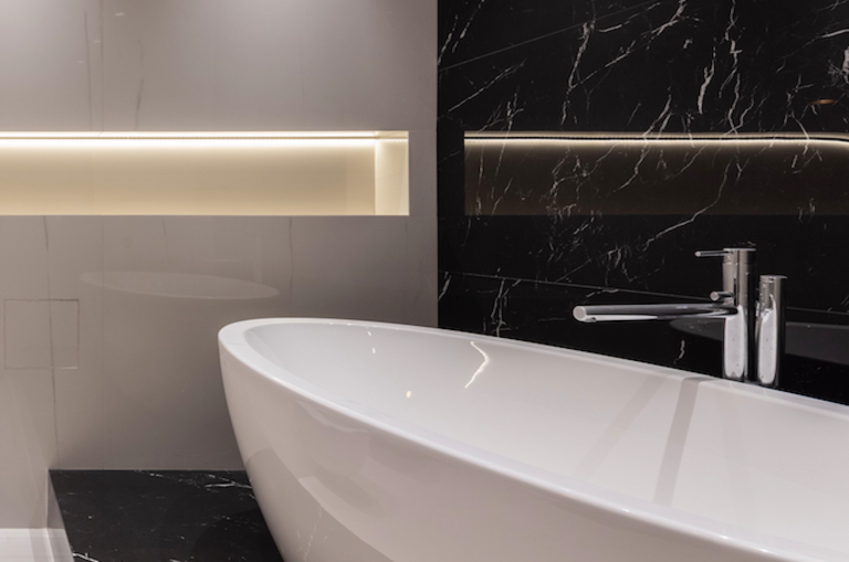 Niche lighting in a luxury bathroom