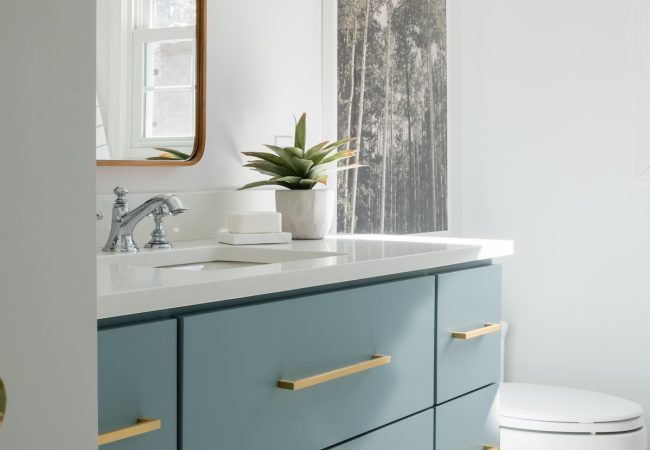 Updated bathroom with sleek vanity and modern finishes (JM Construction)